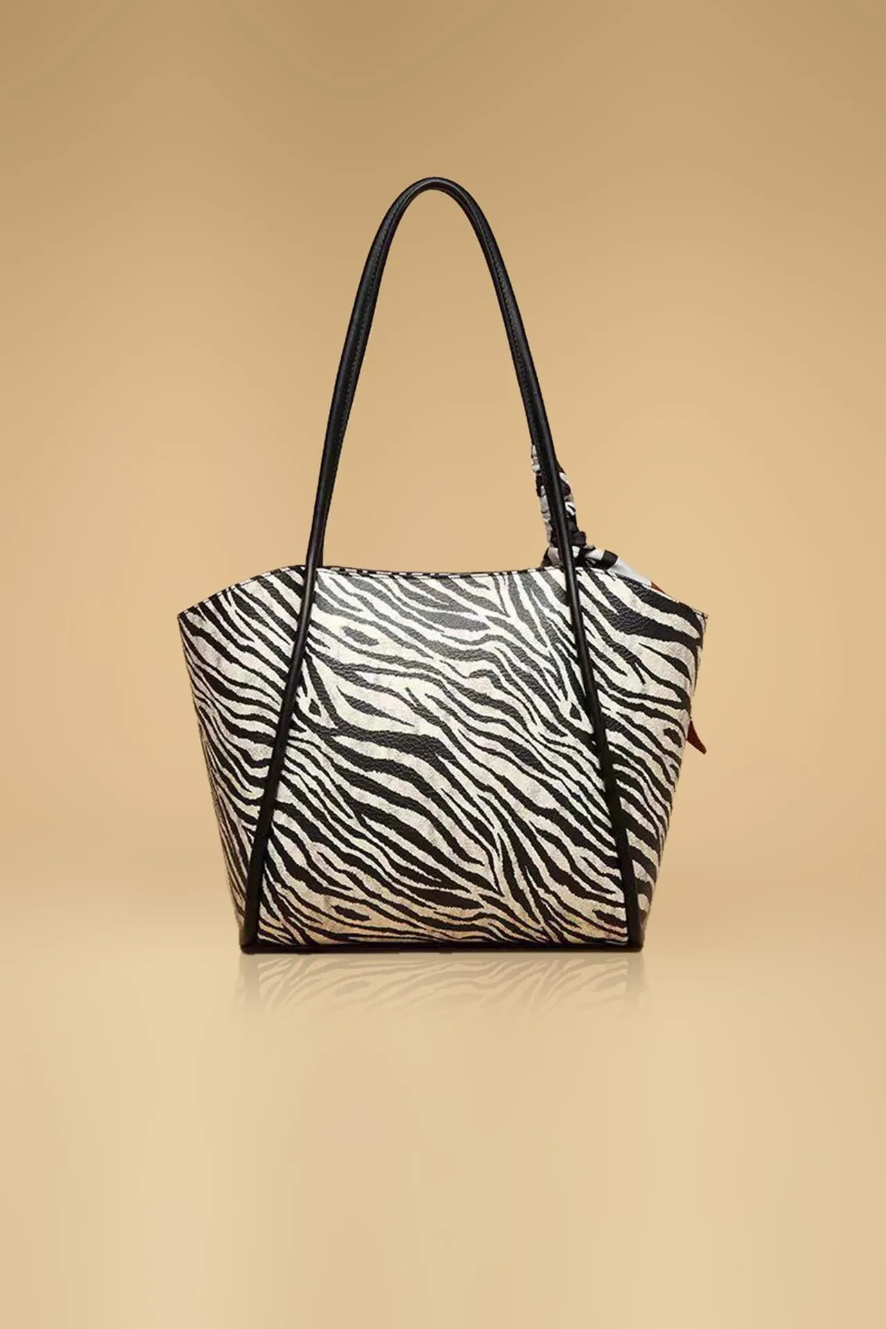 Elegant Zebra Print Handbag With A Stylish Bow