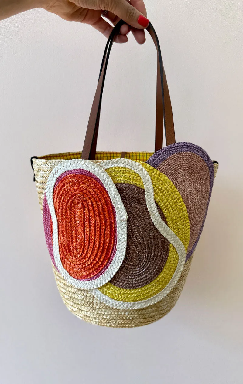 Straw bag with appliqu disc