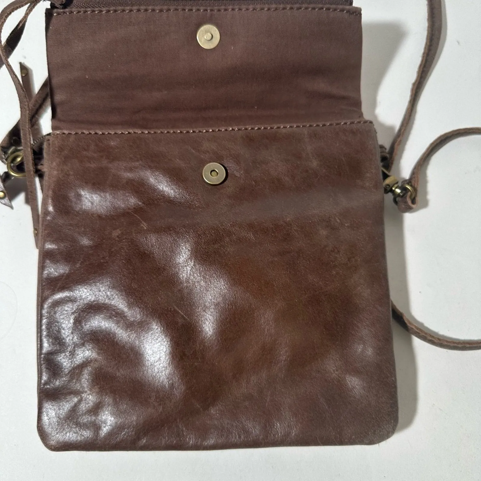 The Sak Brown Crossbody Bag with Metallic Accents