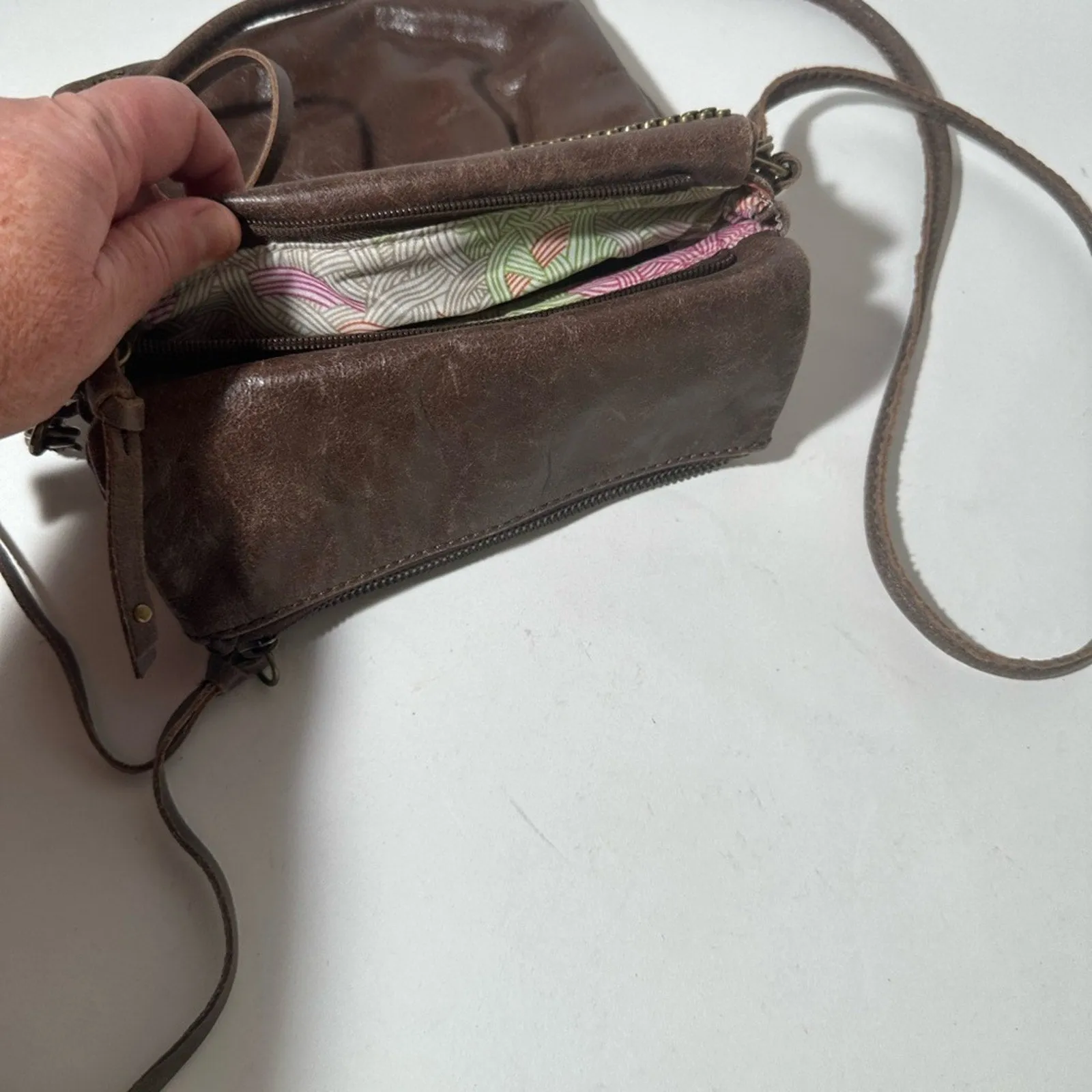 The Sak Brown Crossbody Bag with Metallic Accents