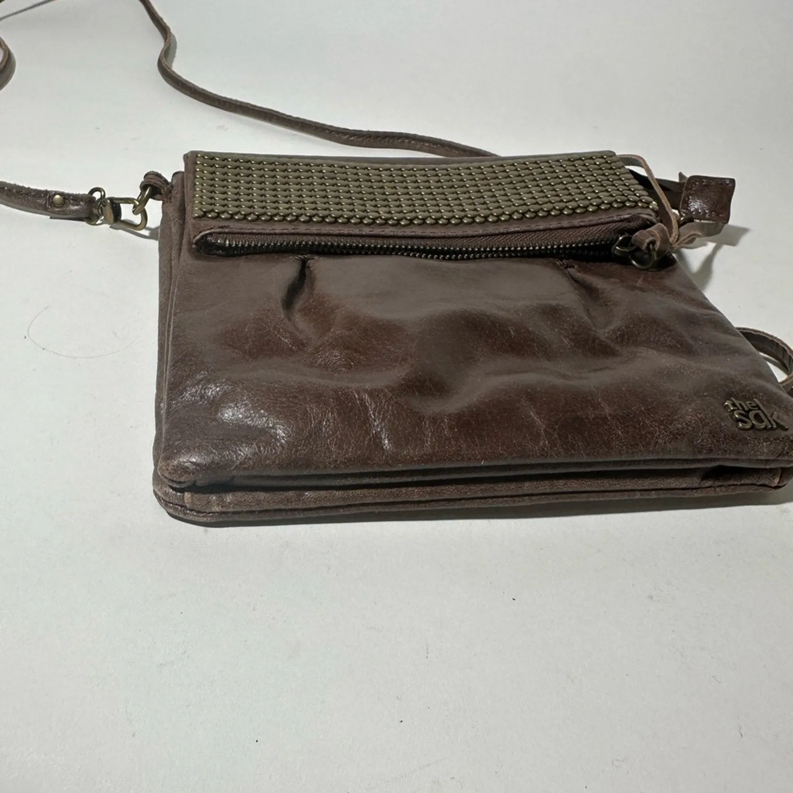 The Sak Brown Crossbody Bag with Metallic Accents
